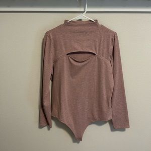 Express body contour pink thong body suit. Snap closure. Sz xl.